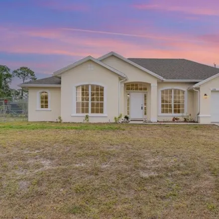 Rent this 3 bed house on 324 Hammonton Street Southwest in Palm Bay, FL 32908