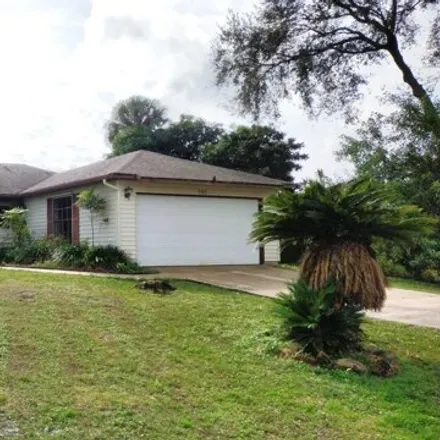 Rent this 4 bed house on 742 Parsons Circle Southeast in Palm Bay, FL 32909