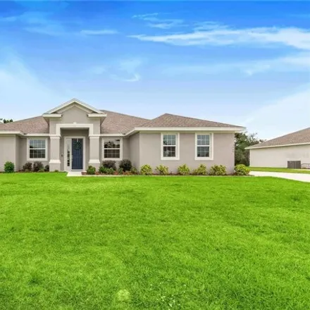 Buy this 4 bed house on 5084 Moss Hammock Trail in Highlands County, FL 33872
