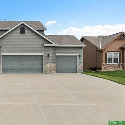 Buy this 4 bed house on 4704 Sheridan Road in Sarpy County, NE 68133