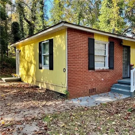 Rent this 3 bed house on 1120 Rebel Forest Drive Southeast in Atlanta, GA 30315