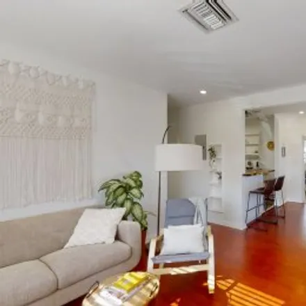 Rent this 3 bed apartment on 1620 Northwest 8Th Street in Grove Park, Miami