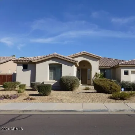 Rent this 5 bed house on 3035 North 144th Drive in Goodyear, AZ 85395