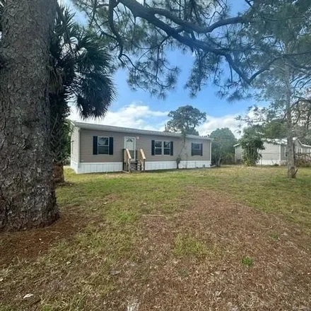 Rent this 3 bed house on 3086 Dover Road in Brevard County, FL 32754