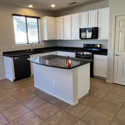 Rent this 4 bed apartment on 11981 West Duane Lane in Peoria, AZ 85383