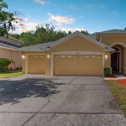 Buy this 4 bed house on 10777 Pearl Berry Loop in Pasco County, FL 34638