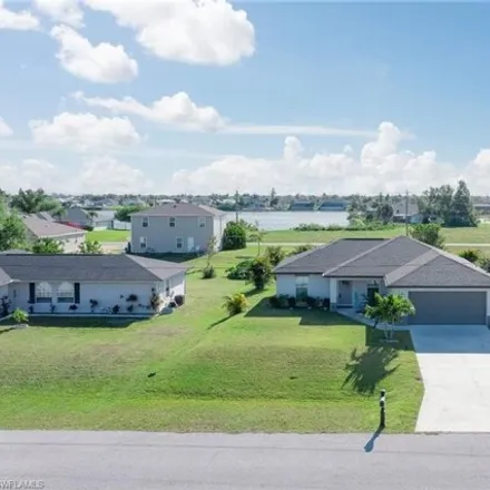 Buy this 3 bed house on 1121 Northwest 4th Place in Cape Coral, FL 33993