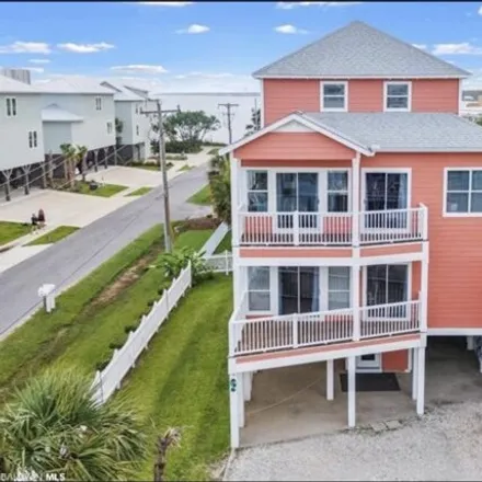 Buy this 4 bed house on Compass Point in 1516 Sandpiper Lane, Gulf Shores