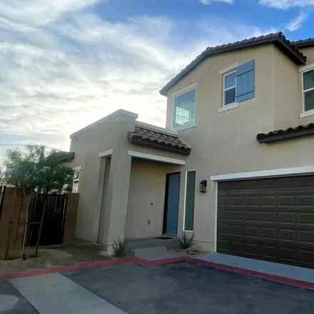 Rent this 4 bed house on 47391 Iris Way in California, 92253