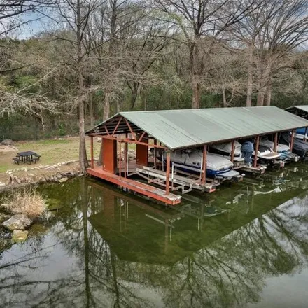 Buy this 4 bed house on 5400 North Scout Island Circle in Austin, TX 78731