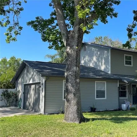 Buy this 4 bed house on 1552 Wexford Drive North in Palm Harbor, FL 34683