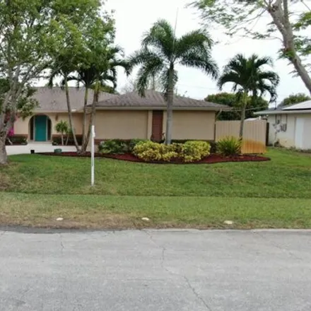 Buy this 3 bed house on 753 Southeast Elwood Avenue in Port Saint Lucie, FL 34983