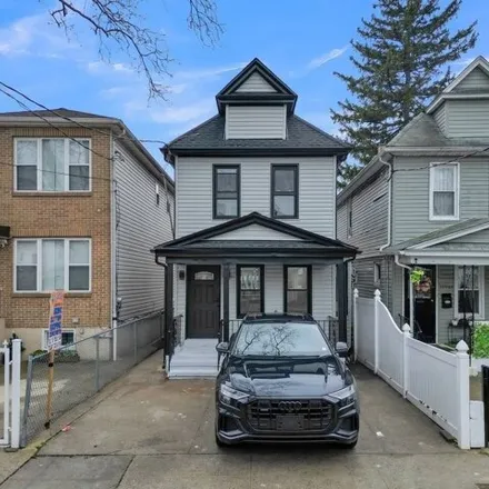 Buy this 3 bed house on 109-48 164th Street in New York, NY 11433