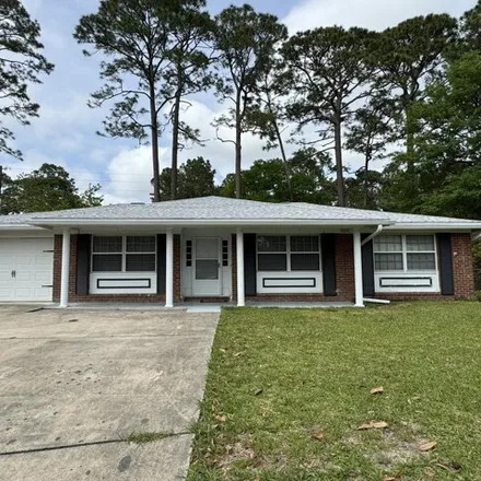 Rent this 3 bed house on 709 Tarpon Lane in Niceville, FL 32578