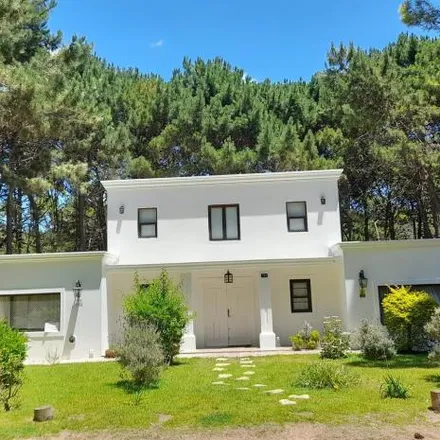 Rent this 4 bed house on Itaca in Partido de Pinamar, 7167 Pinamar