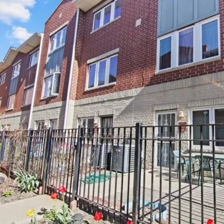 Rent this 3 bed townhouse on West 32nd Place in Chicago, IL 60682