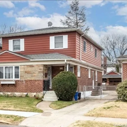Rent this 3 bed house on 69-44 Cloverdale Boulevard in New York, NY 11364