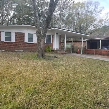 Rent this 3 bed house on 6272 Pettiford Drive East in Jacksonville, FL 32209