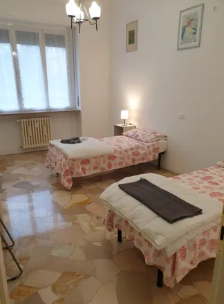 Rent this 4 bed room on Piazza Bolivar in Via Lorenteggio, 20146 Milan MI