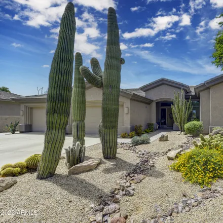 Buy this 4 bed house on 7661 East Whispering Wind Drive in Scottsdale, AZ 85255