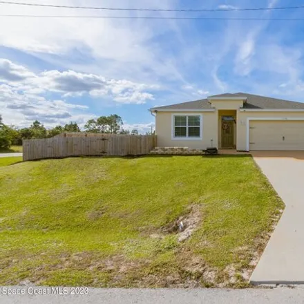 Buy this 4 bed house on J A Bombardier Boulevard Southwest in Palm Bay, FL 32908