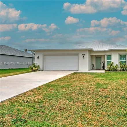 Buy this 4 bed house on 3617 Southwest Conibear Street in Port Saint Lucie, FL 34953