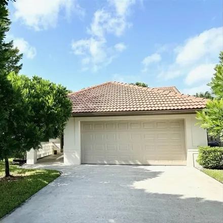 Rent this 3 bed house on 13943 Folkstone Circle in Wellington, FL 33414