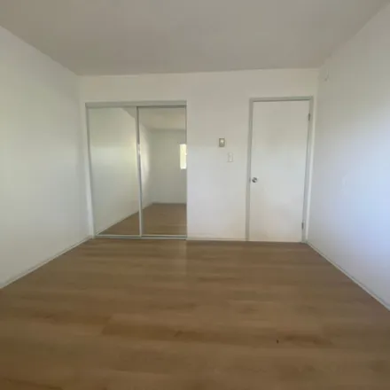 Rent this 3 bed apartment on 5509 Ackerfield Avenue in Long Beach, CA 90805
