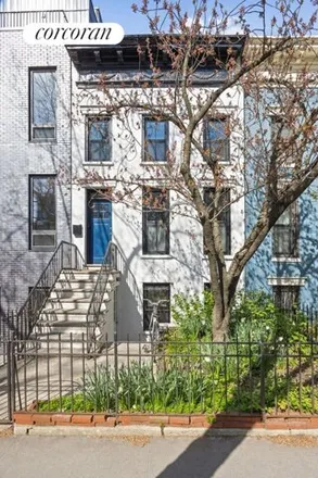 Buy this 2 bed townhouse on 233 8th Street in New York, NY 11215
