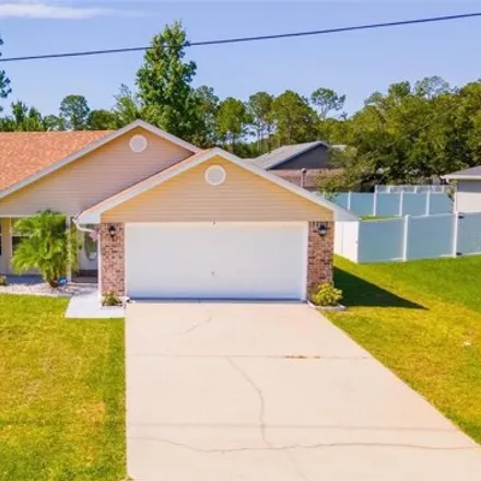 Buy this 3 bed house on 12 Reindeer Lane in Palm Coast, FL 32164