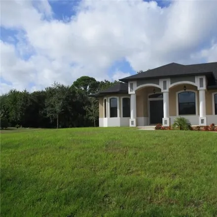 Buy this 3 bed house on 14314 Palmer Avenue in Charlotte County, FL 33953