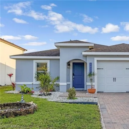 Buy this 3 bed house on 10372 Canal Brook Ln in Lehigh Acres, Florida