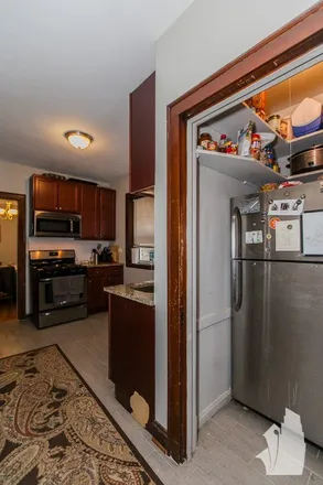 Rent this 3 bed apartment on 3511 North Damen Avenue