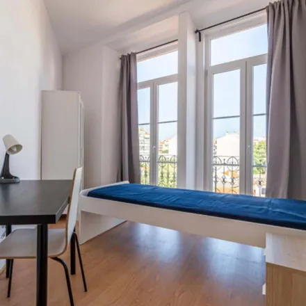 Rent this 9 bed room on Estrada de Benfica 628 in 1500-107 Lisbon, Portugal