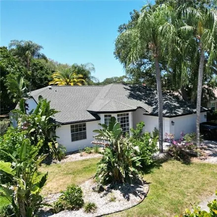 Buy this 4 bed house on 1646 Polo Club Drive in Pinellas County, FL 34689
