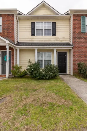 Rent this 2 bed townhouse on 907 Springwood Drive in Jacksonville, NC 28546