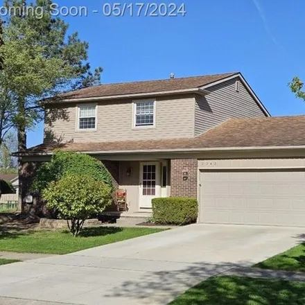 Buy this 3 bed house on 2301 Woodmont Drive West in Canton Township, MI 48188
