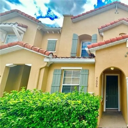 Rent this 3 bed townhouse on 7604 Long Island Drive in Four Corners, FL 34747