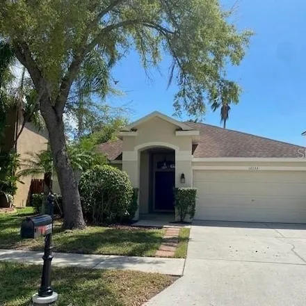 Rent this 3 bed house on 12133 Bishopsford Drive in Hampton Lakes at Main Street, Hillsborough County