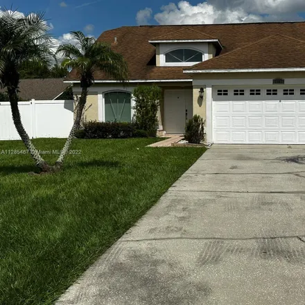 Image 1 - 1719 Golden Poppy Court, Meadow Woods, Orange County, FL 32824, USA - House for rent