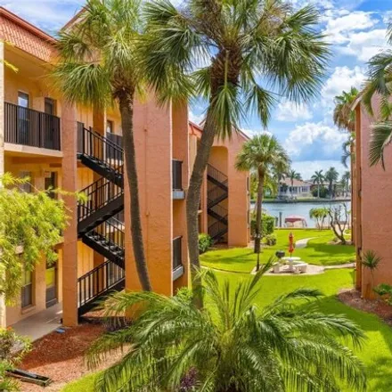Rent this 1 bed condo on 8921 Blind Pass Rd Apt 250 in Saint Pete Beach, Florida
