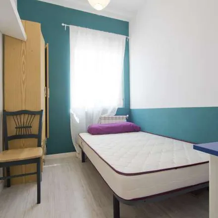 Rent this 7 bed apartment on Madrid in Dia, Calle de Antillón