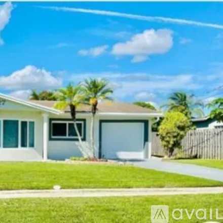 Rent this 3 bed house on 2227 NW 65th Ave
