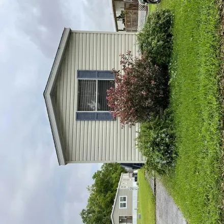 Rent this 3 bed house on Sunshine Avenue in Polk County, FL 33801