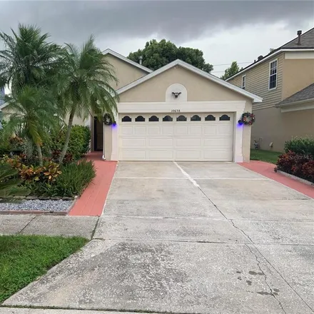 Rent this 3 bed house on 10630 Cherry Oak Circle in Orange County, FL 32817