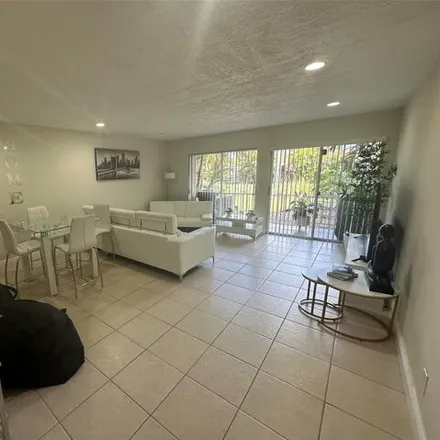 Rent this 2 bed condo on 17911 NW 68th Ave Apt P104 in Hialeah, Florida