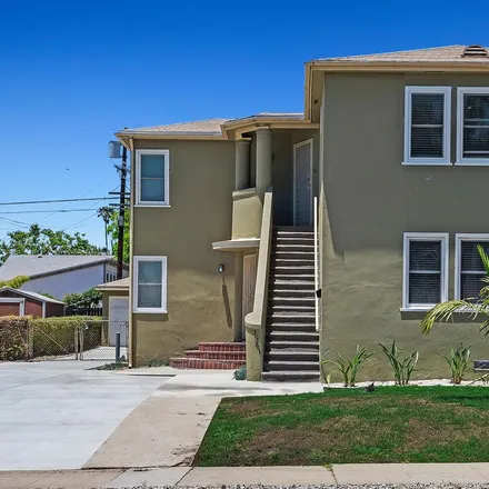 Rent this 3 bed duplex on 1563 South Spaulding Avenue in Los Angeles, CA 90019