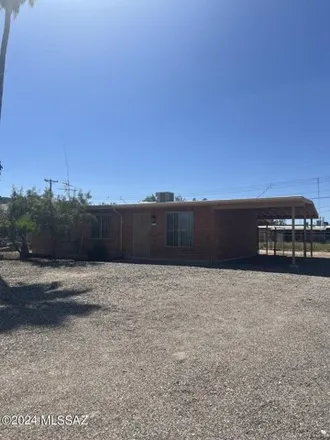 Rent this 3 bed house on 5772 East 35th Street in Tucson, AZ 85711