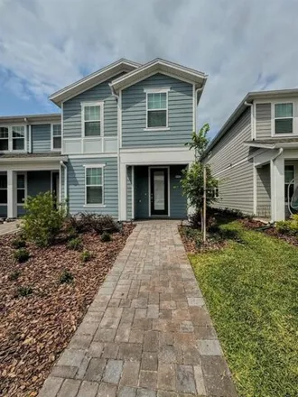 Rent this 4 bed house on Sapelo Beach Drive in Orlando, FL 32832