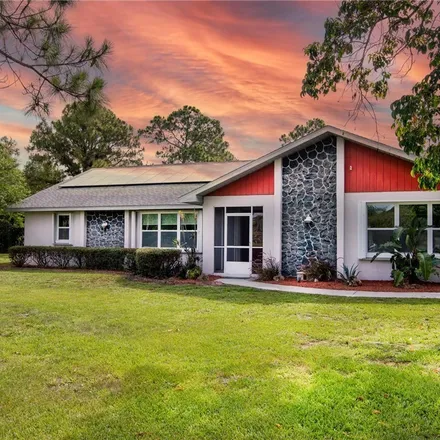 Buy this 3 bed house on 18244 Slater Road in Suncoast Estates, Lee County